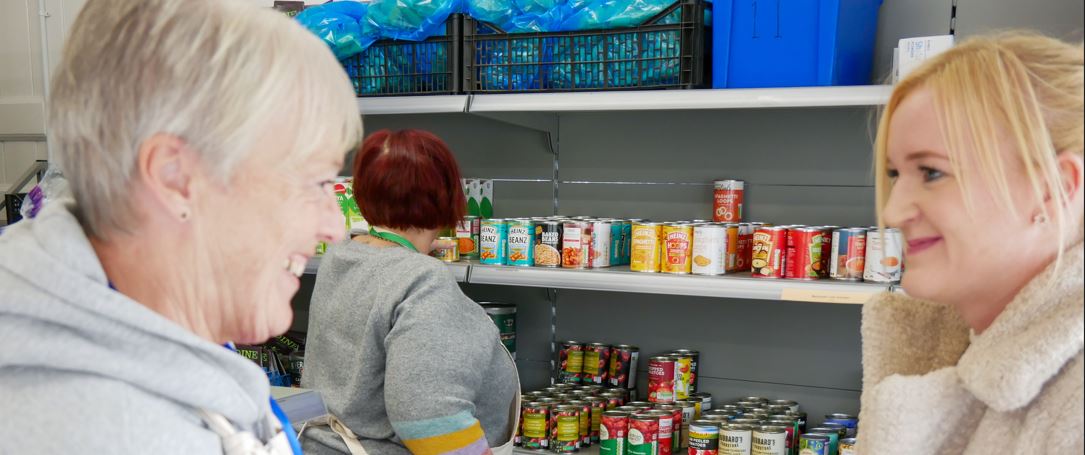 Picture of people in food pantry 